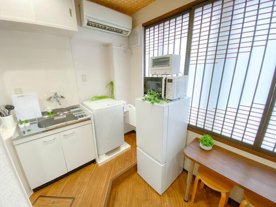 3F Guest House Netomari 西九条駅から徒歩2分 أوساكا المظهر الخارجي الصورة