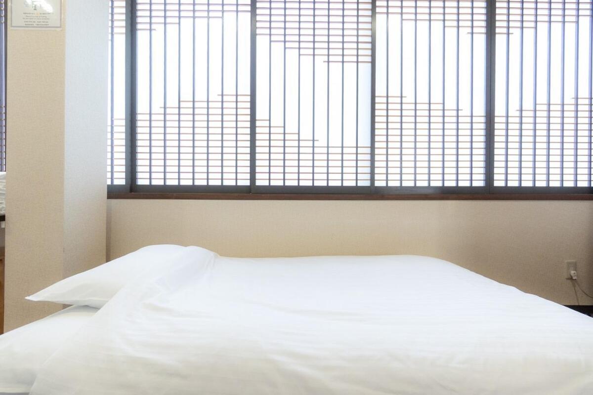 3F Guest House Netomari 西九条駅から徒歩2分 أوساكا المظهر الخارجي الصورة